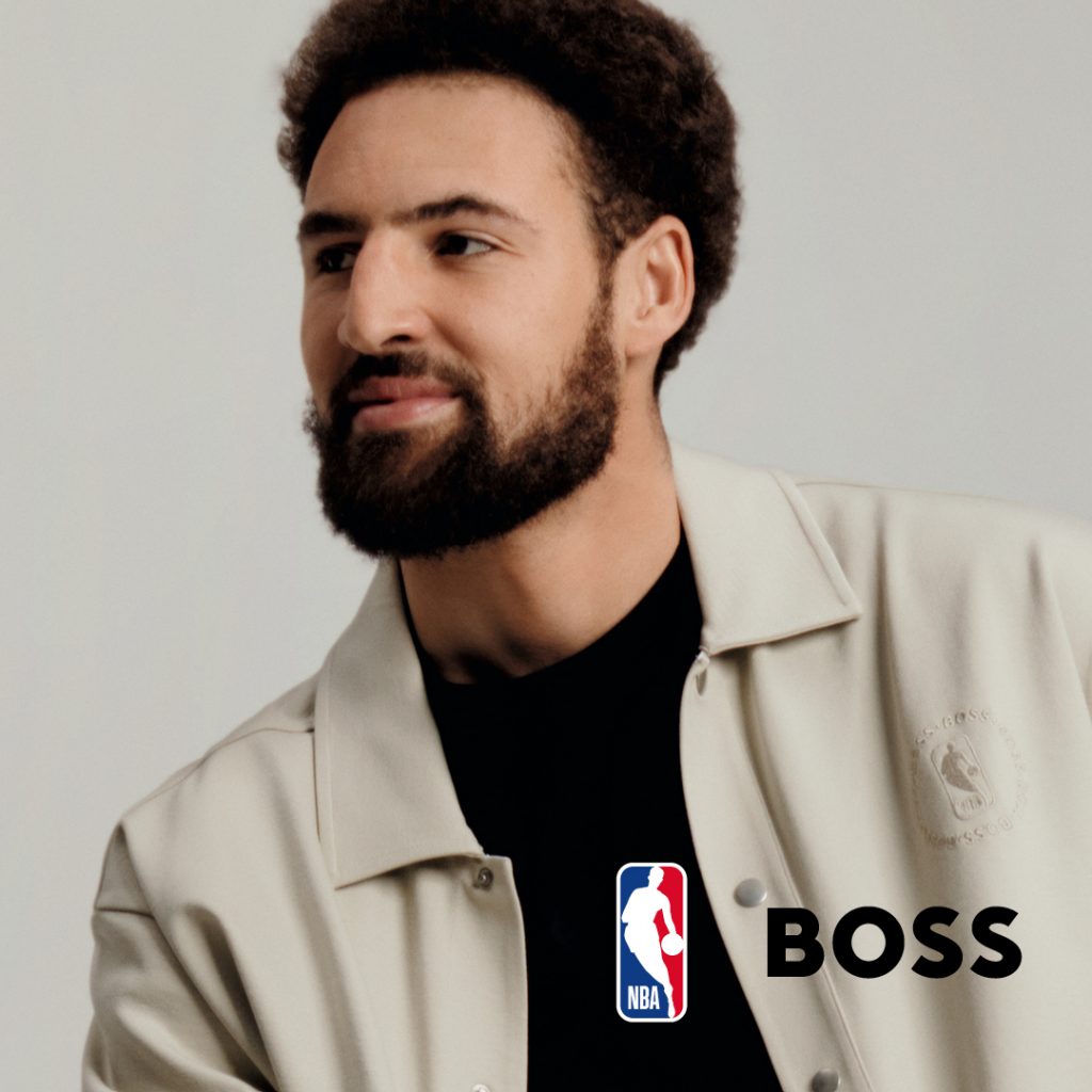 A basketball player wears BOSS x NBA clothing